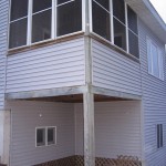 The screened porch was undersized for dining, and needed more glass.